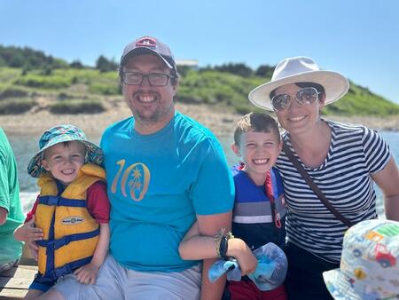 The MacDonald family on a boat